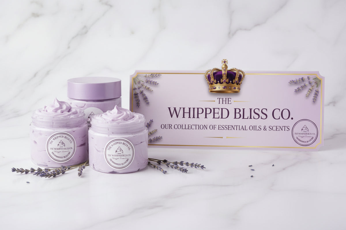 A decorative product banner for 'The Whipped Bliss Co.' featuring a purple and white marble background, gold trim, a gold crown with purple gemstones at the top, and lavender illustrations along the sides.
