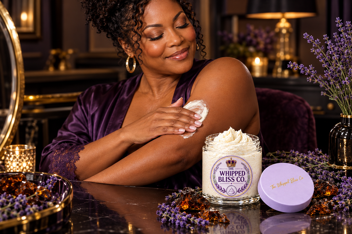 Woman applying Black Amber and Lavender Body Butter at an elegant vanity
