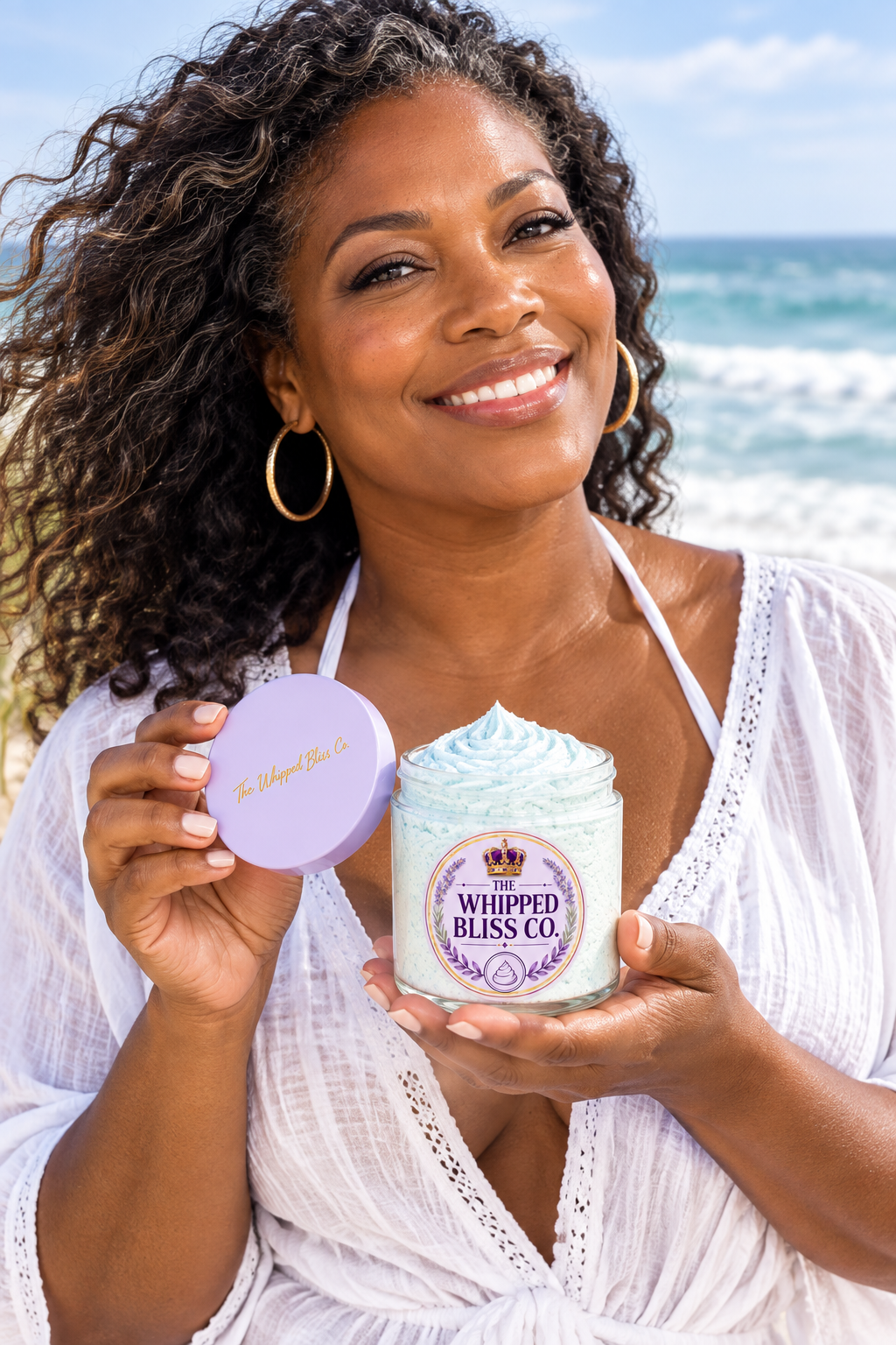 Woman holding Ocean Breeze Body Butter jar for scale reference