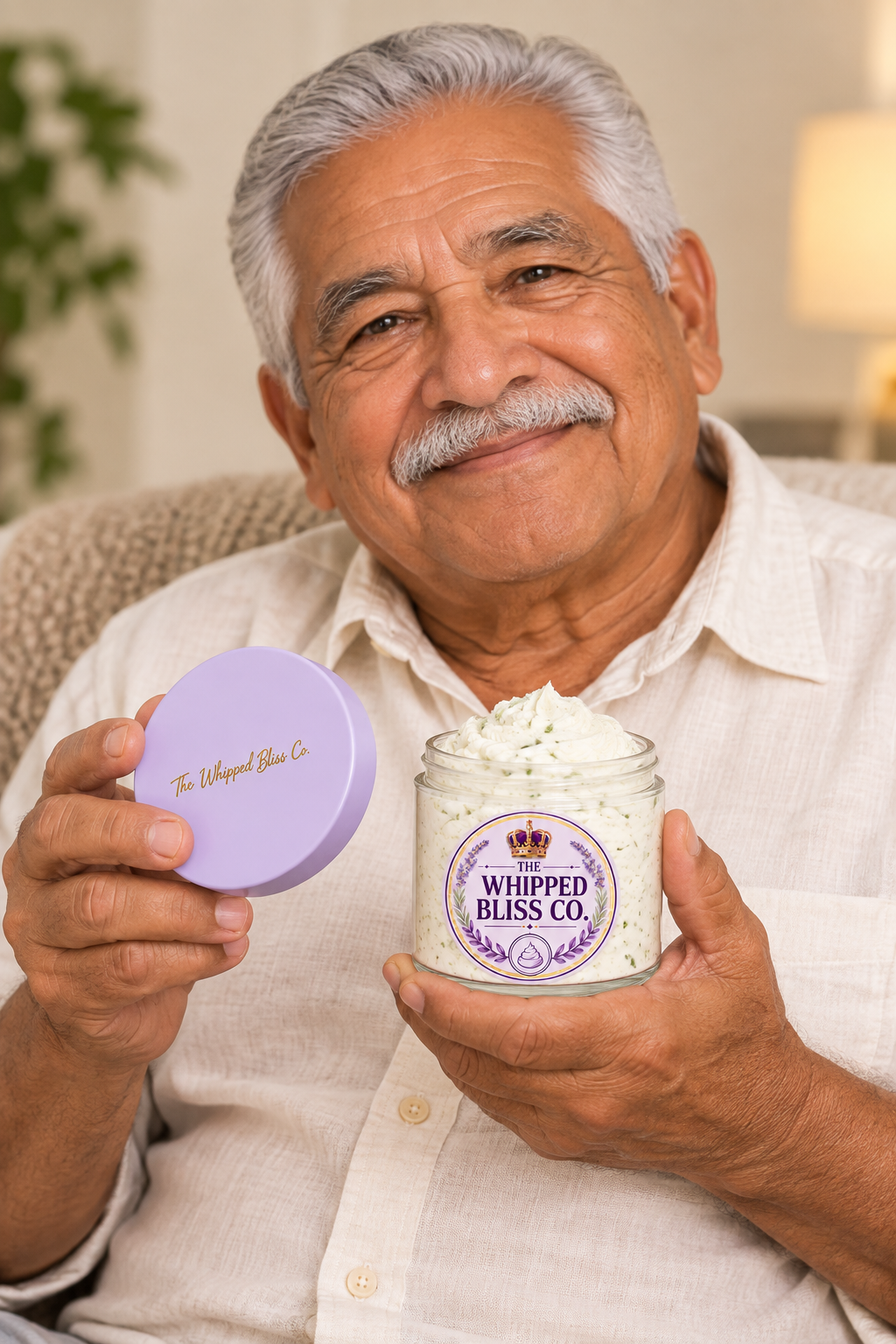 Elderly man holding Tea Tree Body Butter jar for scale reference