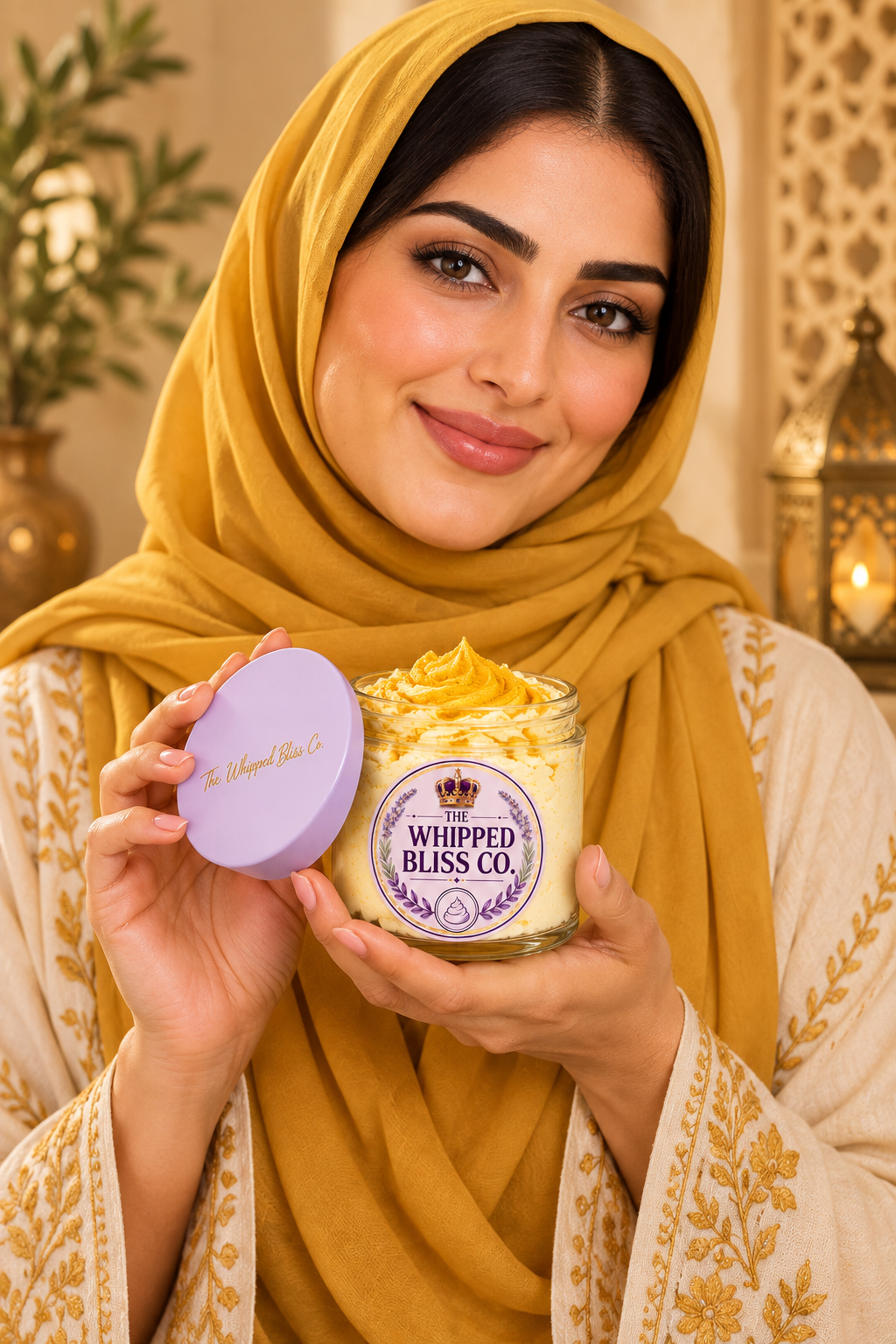 Woman holding Turmeric Body Butter jar for scale reference