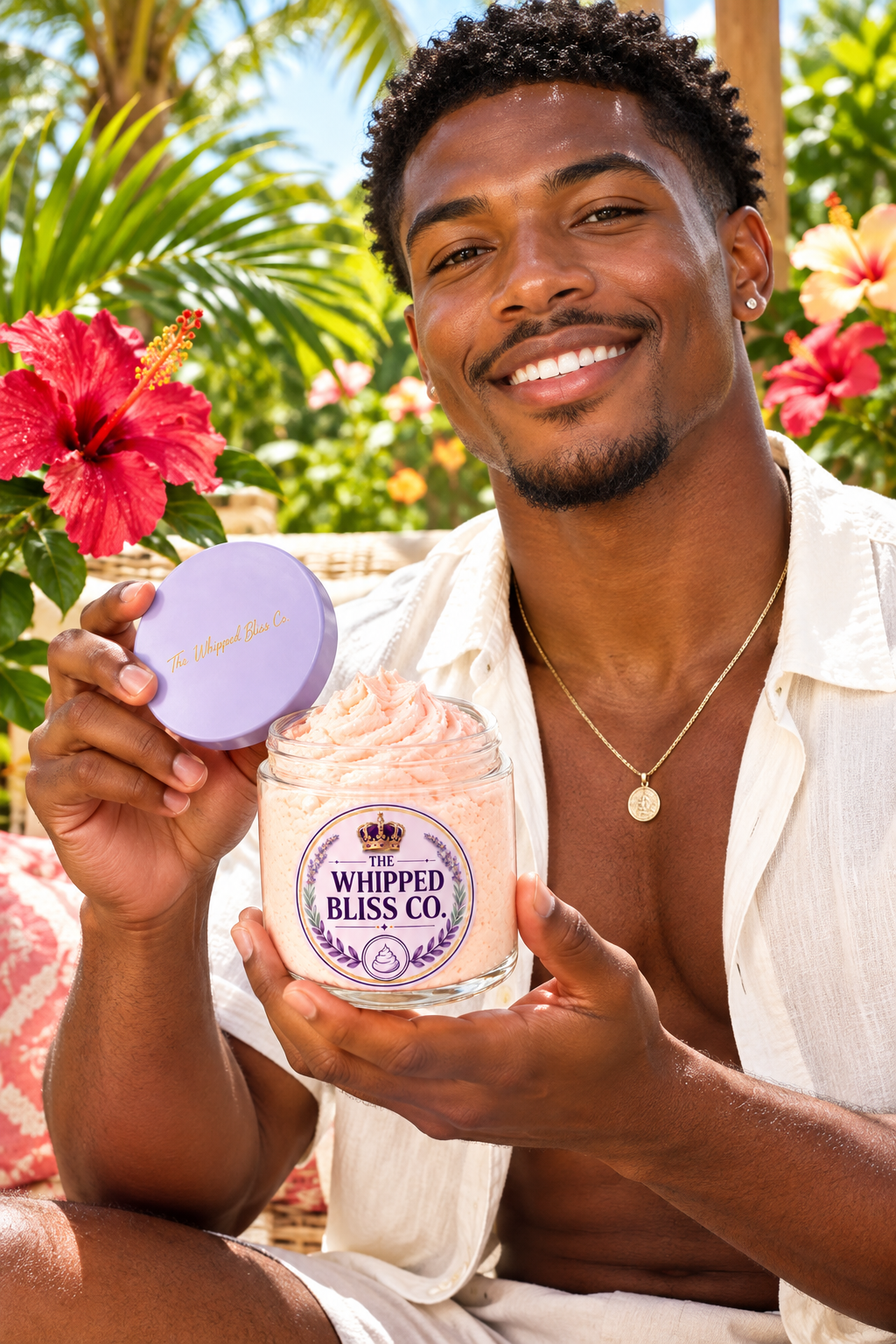 Man holding Tropical Blossom Body Butter jar for scale reference