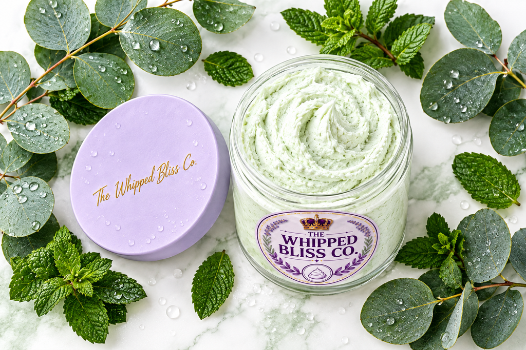 Eucalyptus Body Butter flat lay with eucalyptus and mint leaves