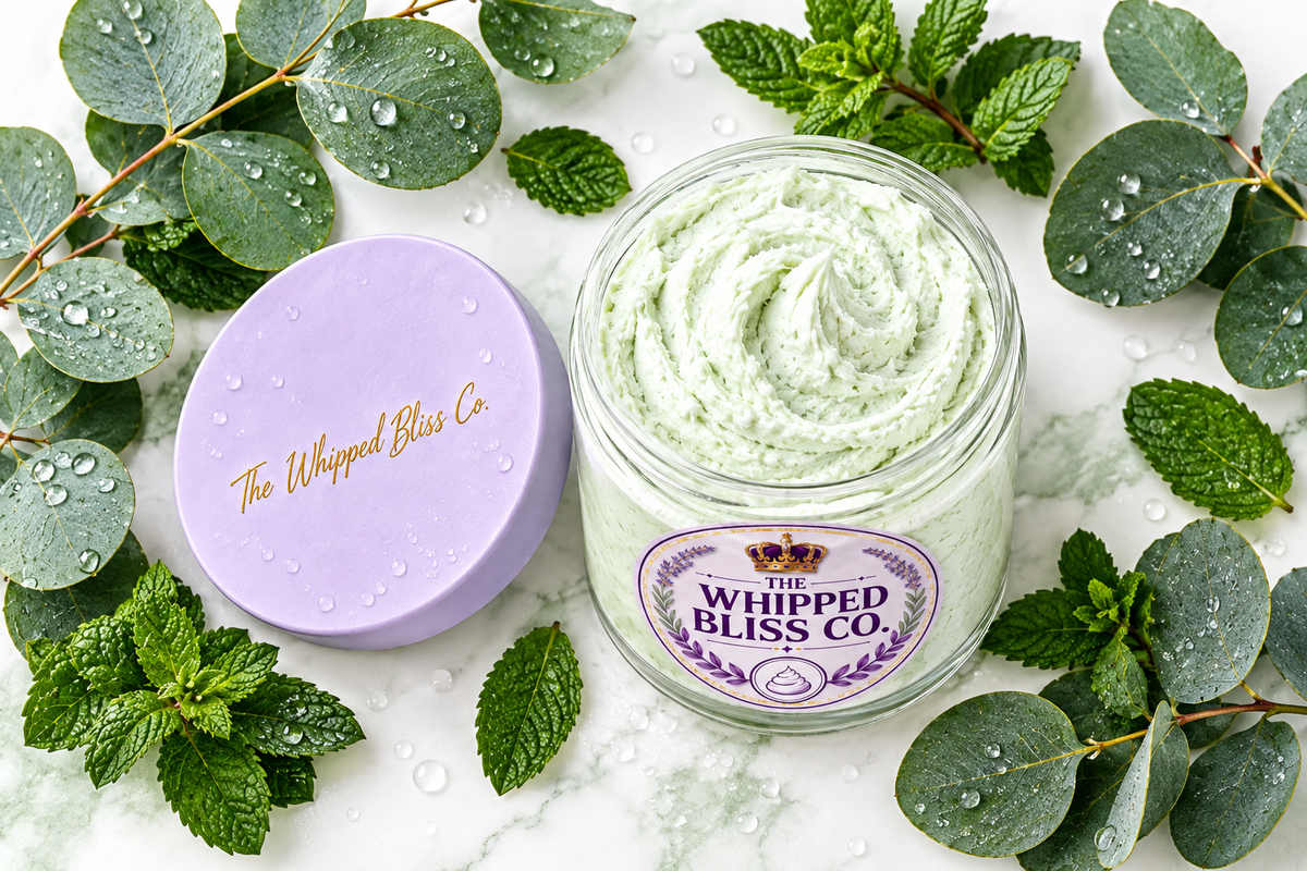 Eucalyptus Body Butter flat lay with eucalyptus and mint leaves