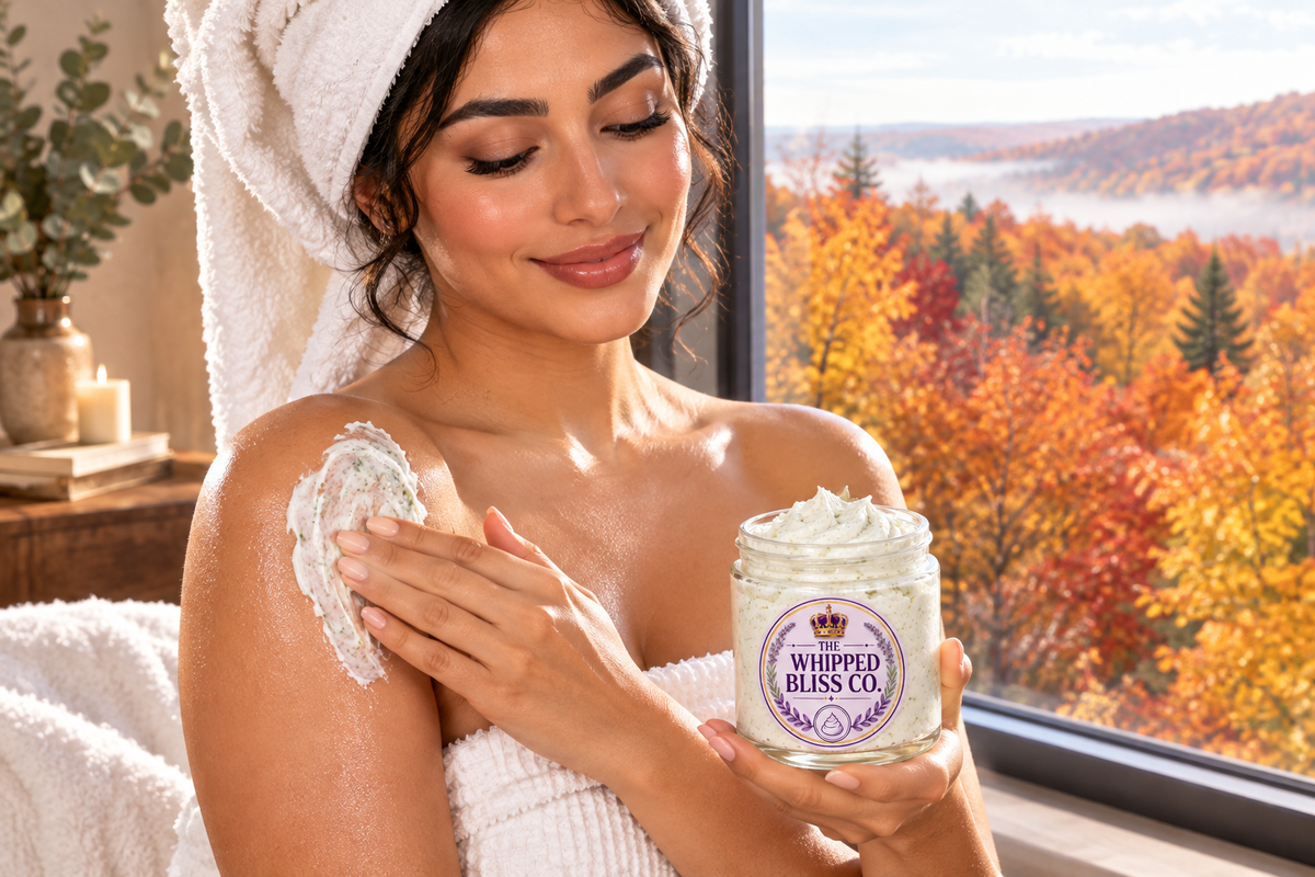 Woman applying Crisp Autumn Air Body Butter by a forest view window