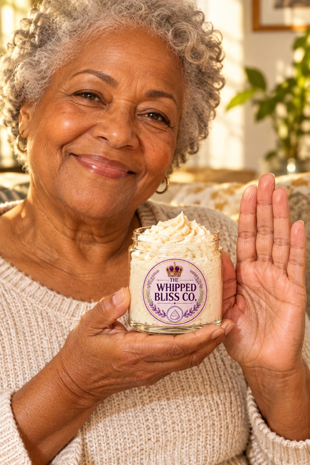 Elderly woman holding Sweet Tobacco Body Butter jar for scale reference