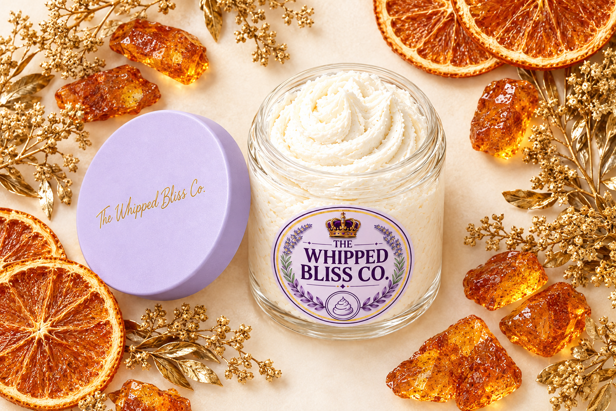 Amber Body Butter flat lay with amber resin and dried oranges