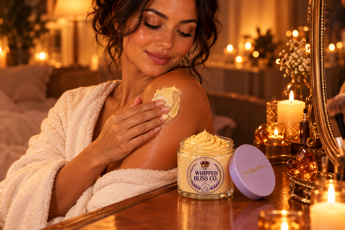 Woman applying Amber & Sandalwood Body Butter at a candlelit vanity