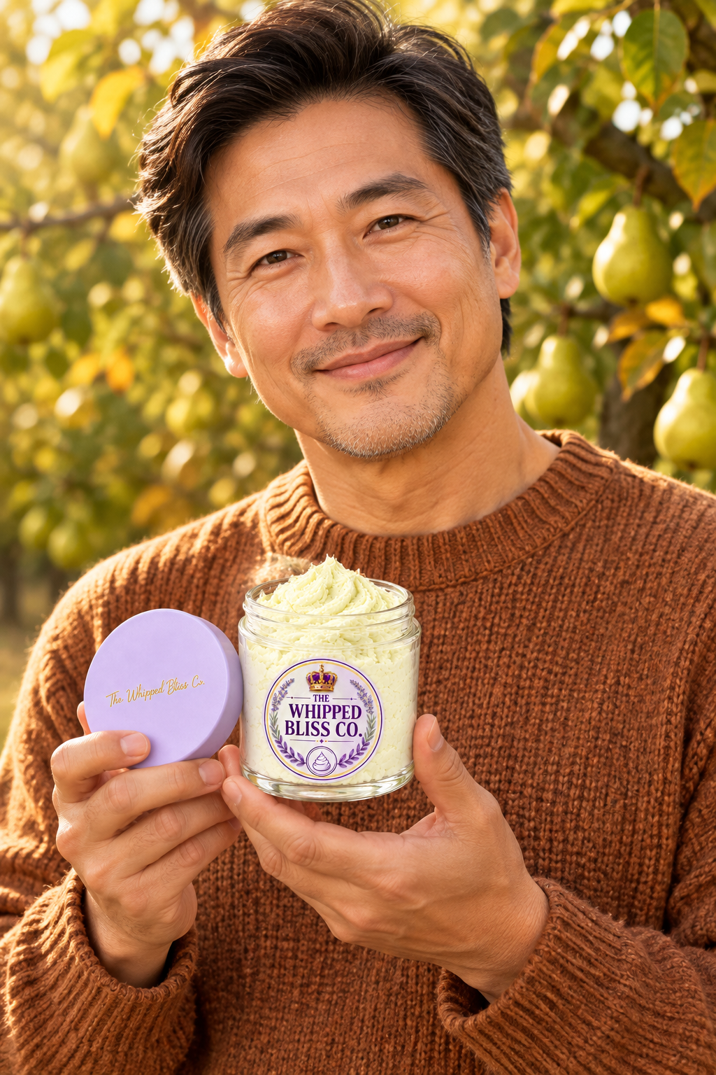 Man holding Pear & Spice Body Butter jar for scale reference